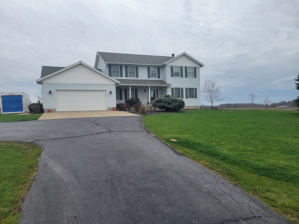 New siding with stone accents and bathroom addition — Attica, Ohio