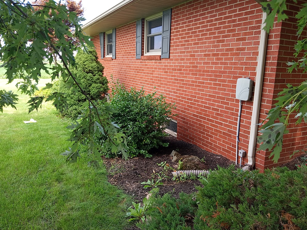 Finished bathroom and closet addition with matching brick exterior — Findlay, Ohio