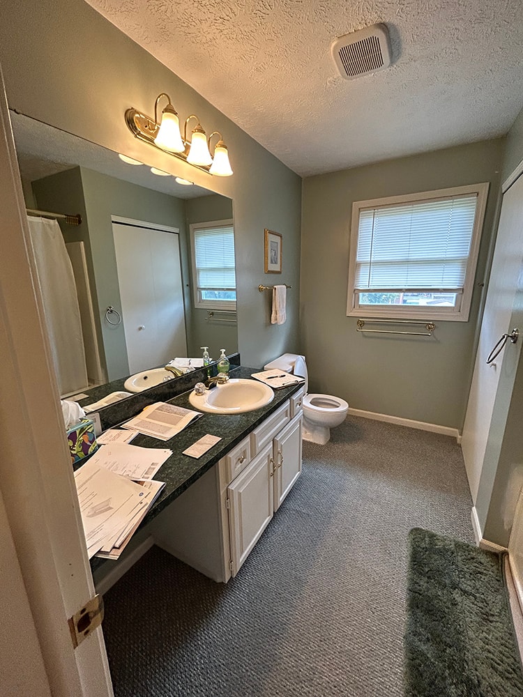 Remodeled bathroom with updated tile and fixtures — Findlay, Ohio