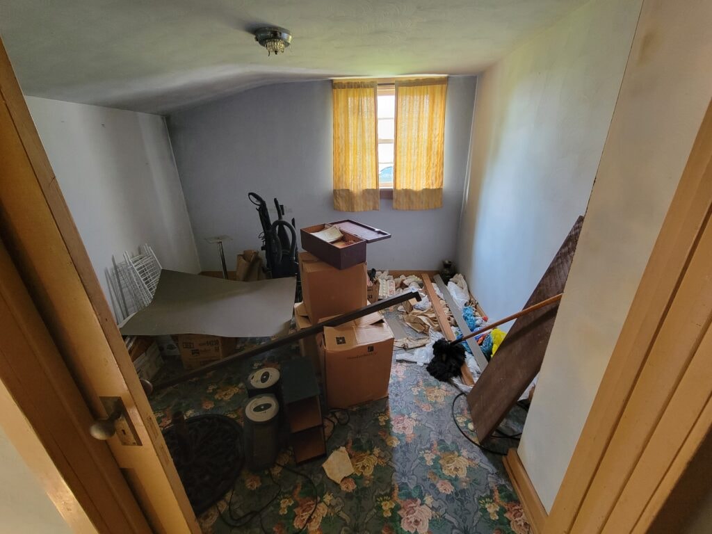 Entire house remodel — during: interior framing showing new floor joists and wall structure — Arlington, Ohio