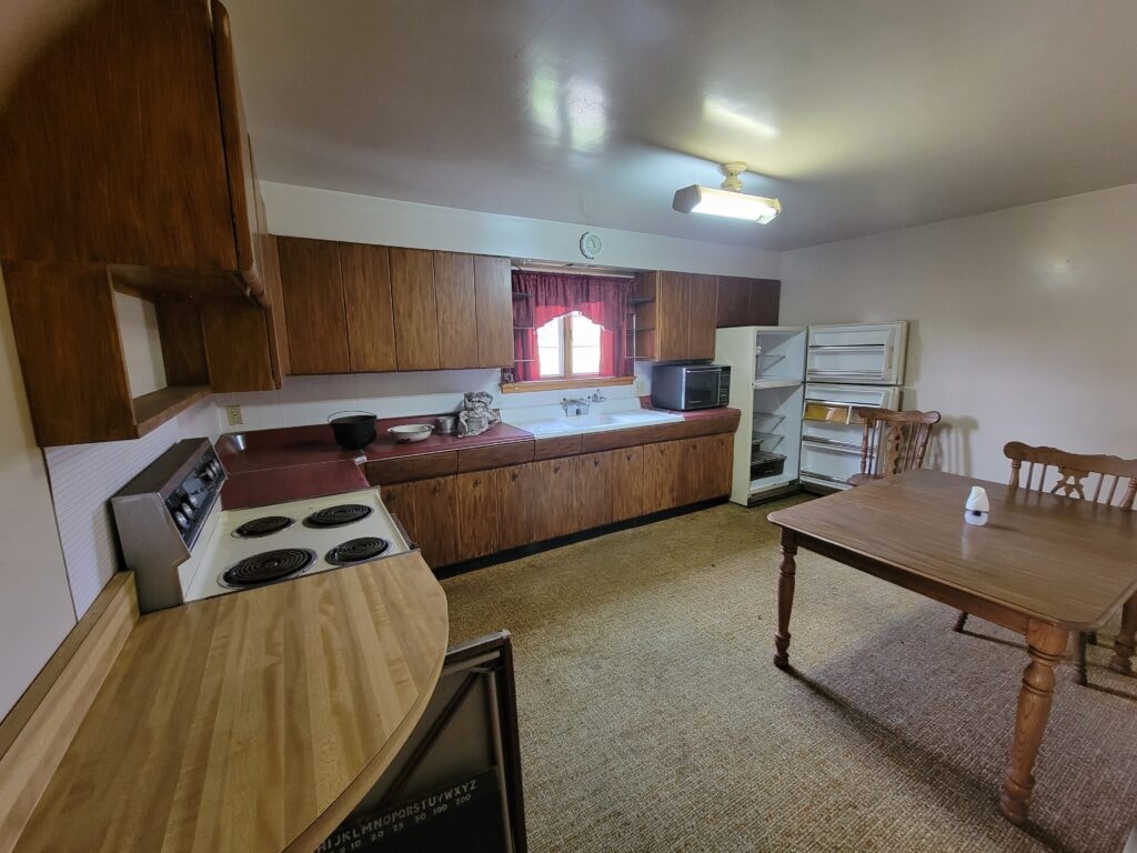 Entire house remodel — during: interior framing with new doorways and electrical rough-in — Arlington, Ohio