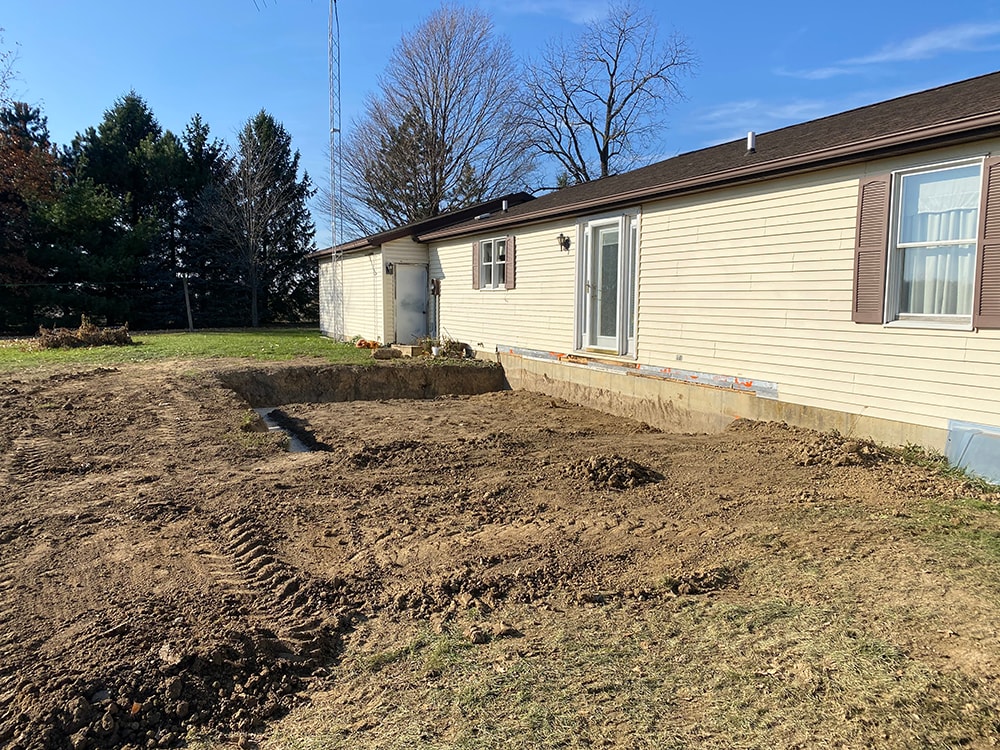 Entire room addition framing and siding in progress — Fostoria, Ohio