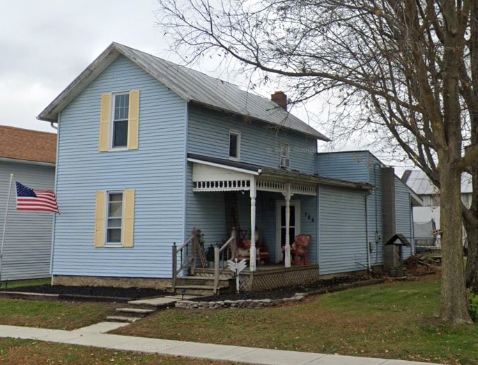 New vinyl siding and large back deck on Benton Ridge home