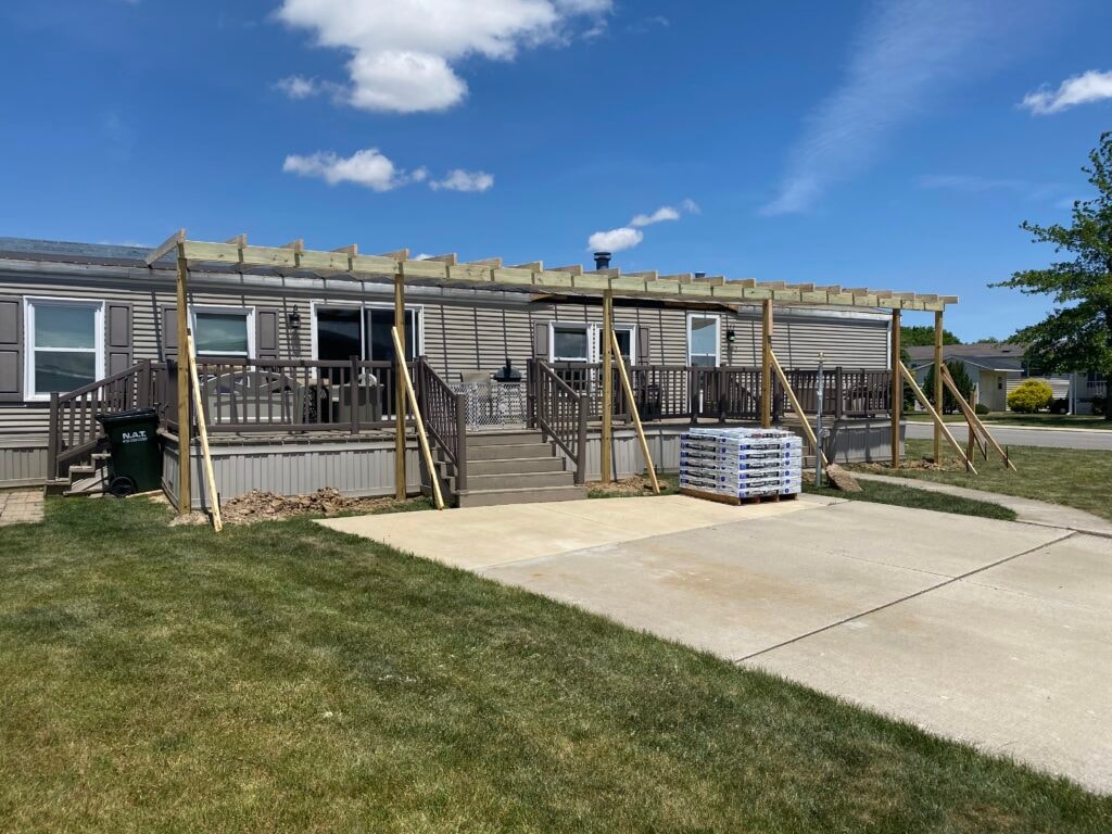 Finished roof addition over existing deck with new wall and window — Findlay, Ohio