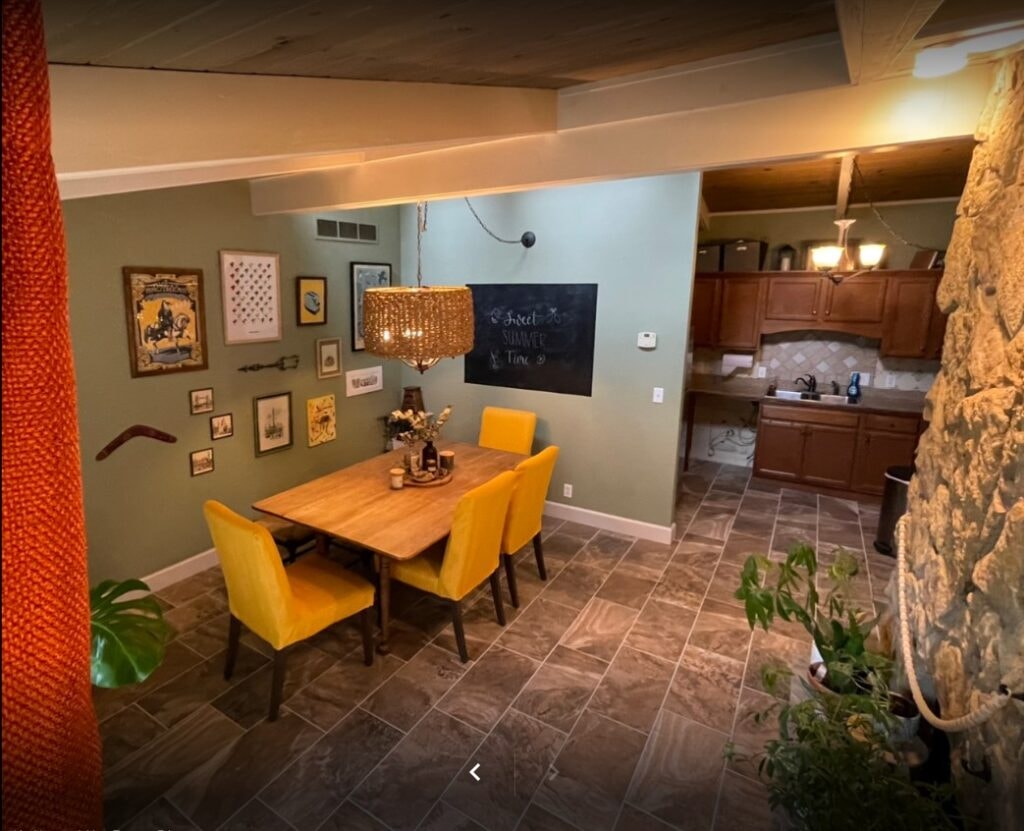 Siding, deck, flooring and stairs — interior after, new tile flooring in dining area with kitchen visible, Findlay, Ohio