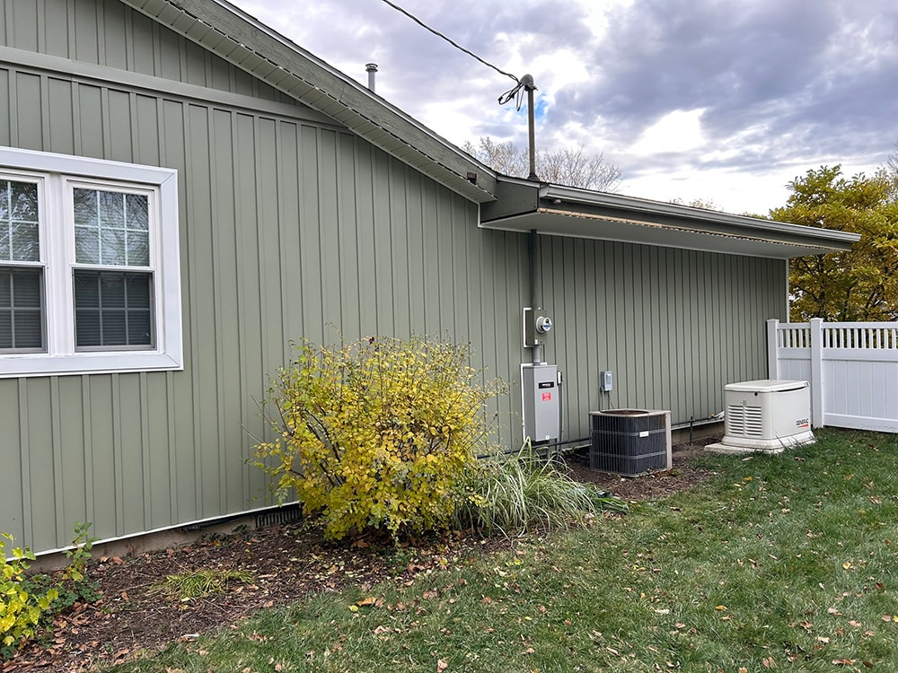 New board and batten siding on entire home in Findlay, Ohio